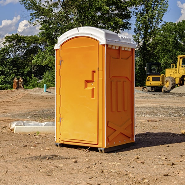 what is the cost difference between standard and deluxe portable restroom rentals in Shirley IL